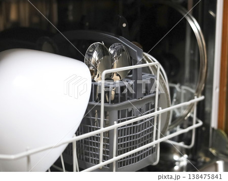 Loaded Dishwasher Interior with Clean Tableware Loaded Dishwasher Interior with Clean Tableware 138475841