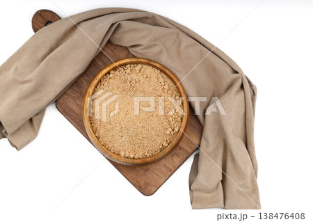 Organic Oleaster Seed Powder in a Rustic Wooden Bowl on a Clean White Background for Healthy Living 138476408