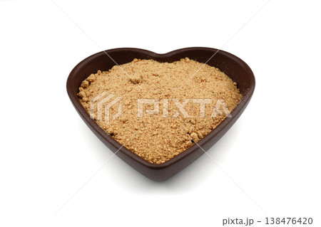 Nutritious Oleaster Seed Powder in Heart Shaped Wooden Bowl on White Background for Heart Health Nutritious Oleaster Seed Powder in Heart Shaped Wooden Bowl on White Background for Heart Health 138476420