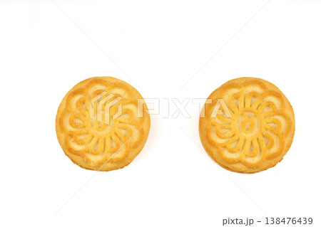 Delicious Crispy Sandwich Biscuit with Smooth Vanilla Cream Filling Isolated on White Background 138476439