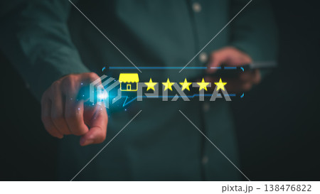 Customer satisfaction and service rating concept. Hand touching five star icon for online review and feedback of retail store experience on smartphone digital interface. Customer satisfaction and service rating concept. Hand touching five star icon for online review and feedback of retail store experience on smartphone digital interface. 138476822