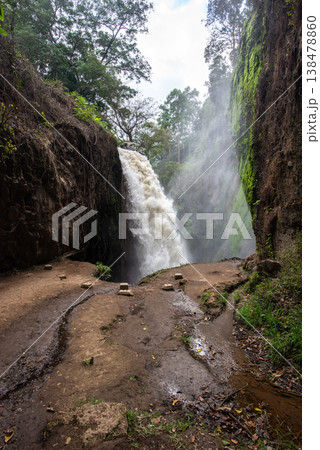 Scenery view of powerful of Blawan waterfall located in Kalianyar village, Sempol district of East Java, Indonesia. 138478860