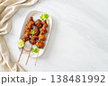 grilled chicken gizzard skewer with herbs and spices 138481992