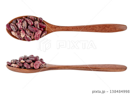 beans in a wooden spoon isolated on white background 138484998
