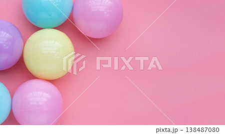 Colorful balls on pink background. Colorful balls on pink background. 138487080