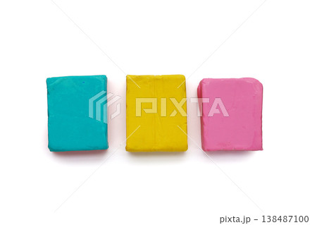 Colorful plasticine clay on white background. Colorful plasticine clay on white background. 138487100