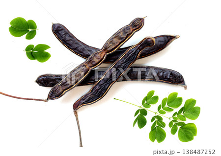 Dried rain tree pods isolated on white background Dried rain tree pods isolated on white background 138487252
