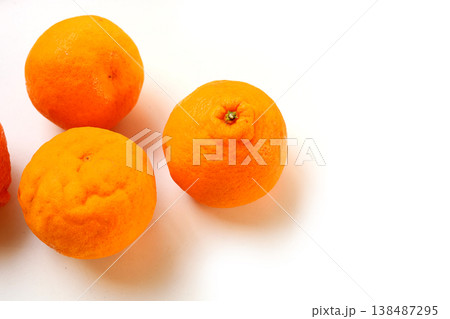 Four fresh Sumo oranges placed on a white background. Four fresh Sumo oranges placed on a white background. 138487295