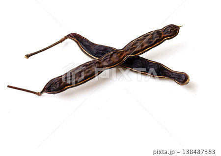 Dried rain tree pods isolated on white background Dried rain tree pods isolated on white background 138487383