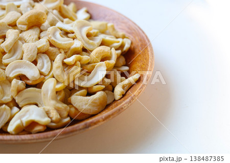 Cashew nuts isolated on white background Cashew nuts isolated on white background 138487385