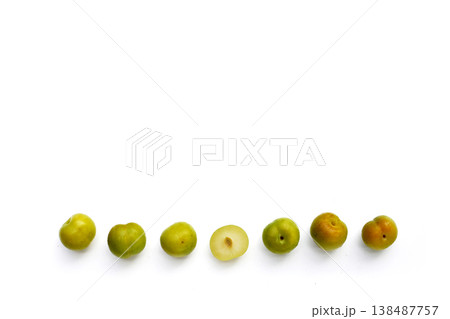 Fresh green plum fruit on white background. Fresh green plum fruit on white background. 138487757