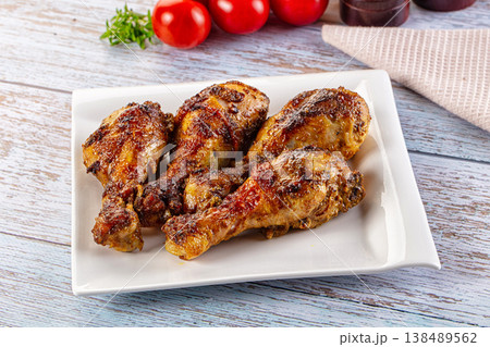 Baked chicken drumsticks with spices 138489562