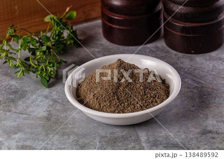 Ground dry black pepper powder 138489592