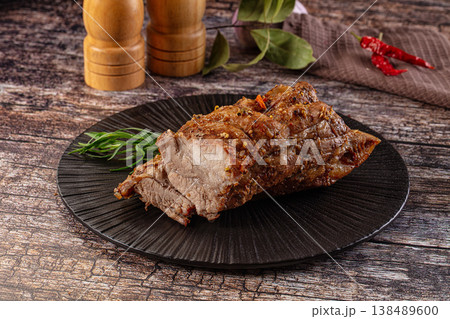 Baked pork sirloin with spices 138489600