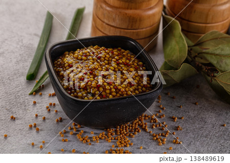 French mustard sauce with seeds 138489619