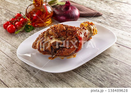 Baked pork knuckle with spices 138489628