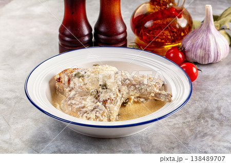 Roasted rabbit legs in cream sauce Roasted rabbit legs in cream sauce 138489707