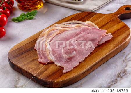 Sliced pork ham over board 138489756