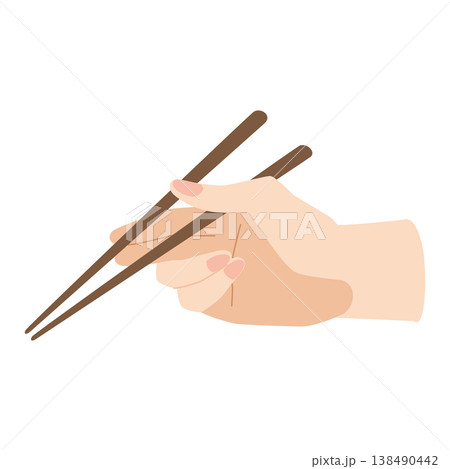 箸を持つ手　箸で掴んで食べる 138490442