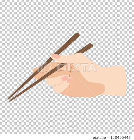 箸を持つ手　箸で掴んで食べる 138490442