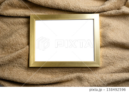 Gold Picture Frame Mockup on Brown Knitted Textile 138492596