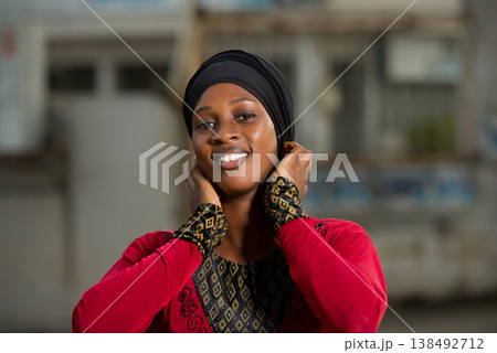 close up of young woman, smiling. close up of young woman, smiling. 138492712