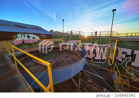 Abandoned Graffiti Covered Goldome Mill Tanks Sunburst at Golden Hour California Abandoned Graffiti Covered Goldome Mill Tanks Sunburst at Golden Hour California 138493342