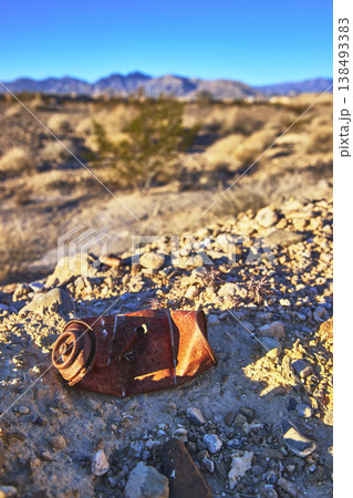 Rusty Spray Can in Desert Landscape at Golden Hour Near Las Vegas 138493383