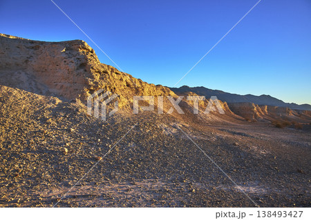 Golden Hour Sunlight on Rugged Tule Springs Fossil Bed Rock Formations 138493427