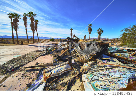 Abandoned Graffiti Covered Ruins and Palm Trees at Lake Dolores Water Park California 138493455