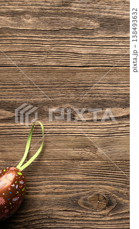 Decorative Easter egg on rustic wooden background 138493632