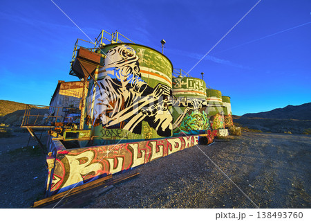 Graffiti Covered Tanks at Abandoned Goldome Mill in Mojave Desert at Golden Hour Graffiti Covered Tanks at Abandoned Goldome Mill in Mojave Desert at Golden Hour 138493760