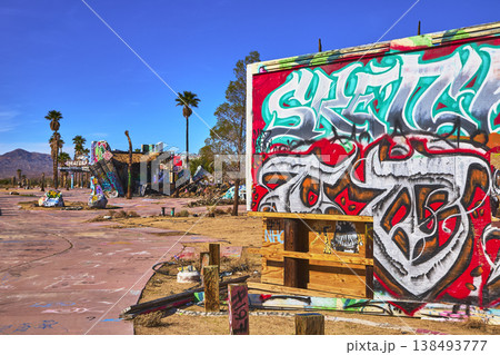Graffiti Wall Abandoned Lake Dolores Water Park Palm Trees in California Desert Graffiti Wall Abandoned Lake Dolores Water Park Palm Trees in California Desert 138493777