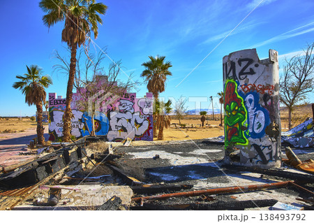 Abandoned Lake Dolores Water Park Graffiti Palm Trees and Desert Landscape California Abandoned Lake Dolores Water Park Graffiti Palm Trees and Desert Landscape California 138493792