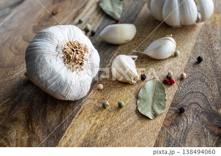 Garlic Preparation on Wooden Surface Garlic Preparation on Wooden Surface 138494060