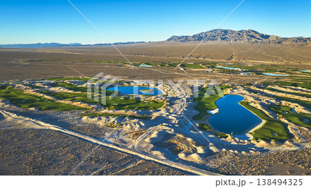 Aerial Golf Course Las Vegas Nevada Desert Oasis and Mountain View Golden Hour Aerial Golf Course Las Vegas Nevada Desert Oasis and Mountain View Golden Hour 138494325