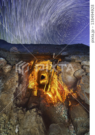 Abandoned Nevada Mine Entrance with Light Painting and Star Trails at Night 138494928