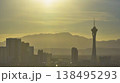 Aerial Las Vegas Strip Skyline Stratosphere Tower and Mountains Golden Hour 138495293