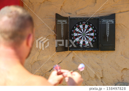 Egypt, Sharm el-Sheikh - September 30, 2025. Tourists spend their free time playing darts on the beach of the Savoy Hotel. Editorial Egypt, Sharm el-Sheikh - September 30, 2025. Tourists spend their free time playing darts on the beach of the Savoy Hotel. Editorial 138497828