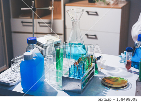 Science, laboratory and woman with pipette, test tube and biotech solution in research. Medical innovation, scientist or lab technician in study for healthcare, medicine and vaccine results feedback. 138498008