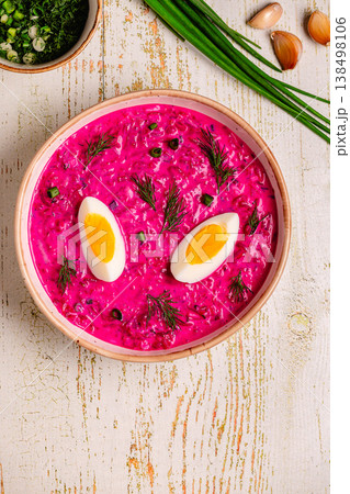 Cold summer soup of beets, yogurt, cucumbers, eggs and dill. 138498106