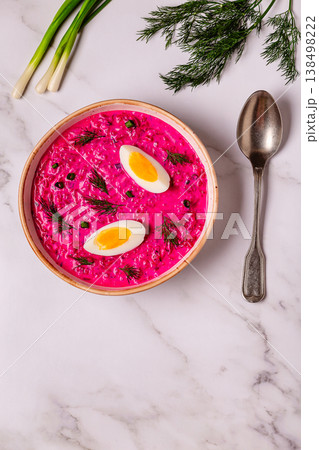 Cold summer soup of beets, yogurt, cucumbers, eggs and dill. 138498222