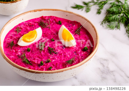 Cold summer soup of beets, yogurt, cucumbers, eggs and dill. 138498226