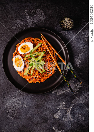 Korean traditional food, cucumber and boiled egg cold spicy noodles. 138498230