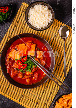 Korean traditional food, spicy kimchi soup (kimchi tige) with pork and tofu cheese. 138498235