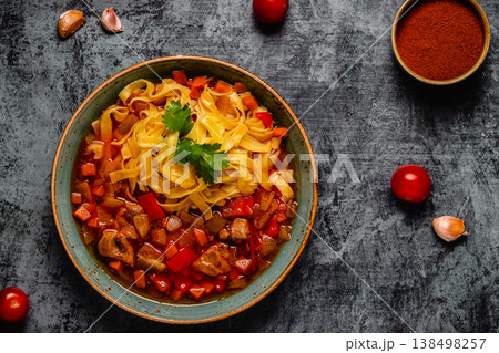 Lagman soup with lamb, homemade noodles and vegetables. Lagman soup with lamb, homemade noodles and vegetables. 138498257