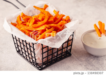 Sweet potato fries with blue cheese sauce. Sweet potato fries with blue cheese sauce. 138498307