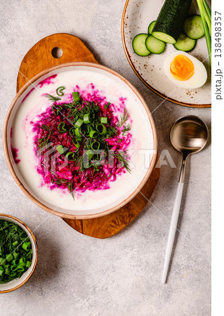 Cold summer soup of beets, kefir, cucumbers, eggs and dill. 138498357