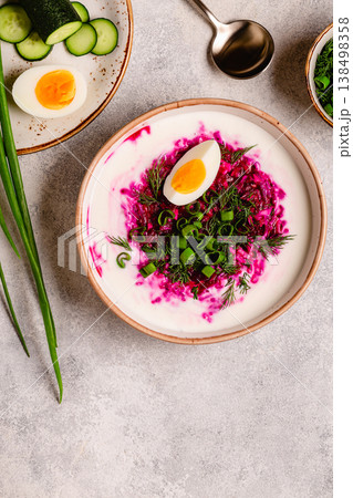 Cold summer soup of beets, kefir, cucumbers, eggs and dill. 138498358