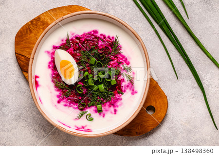 Cold summer soup of beets, kefir, cucumbers, eggs and dill. 138498360